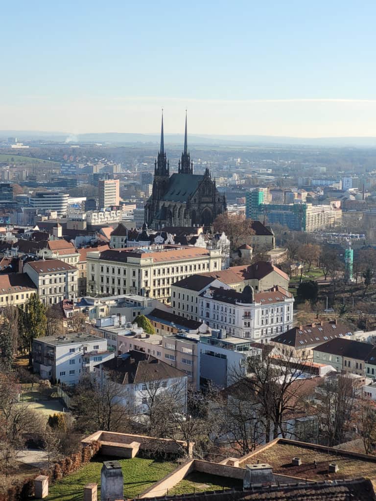 The view from Špilberk Castle's tower that includes traditional buildings and at the center the church of St. George and St. Peter