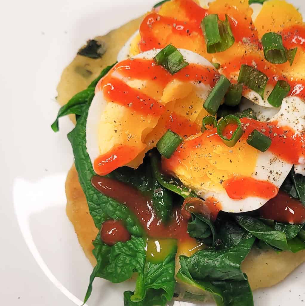 A closeup on an open-faced sandwich
