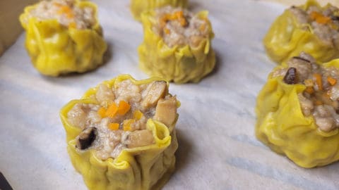 Closeup of siu mai in bamboo steamer