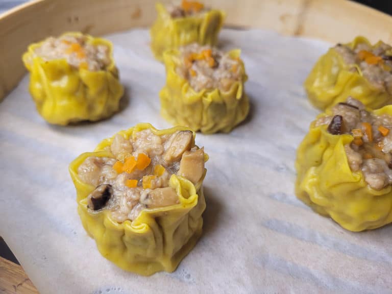 Closeup of siu mai in bamboo steamer