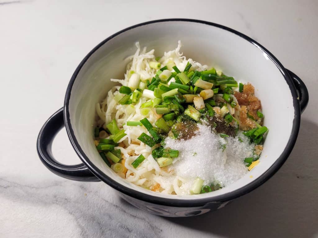 Unmixed cheese hotteok ingredients in a bowl