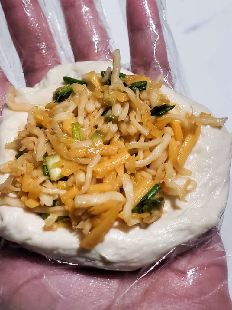 Cheese filling in the middle of hotteok dough