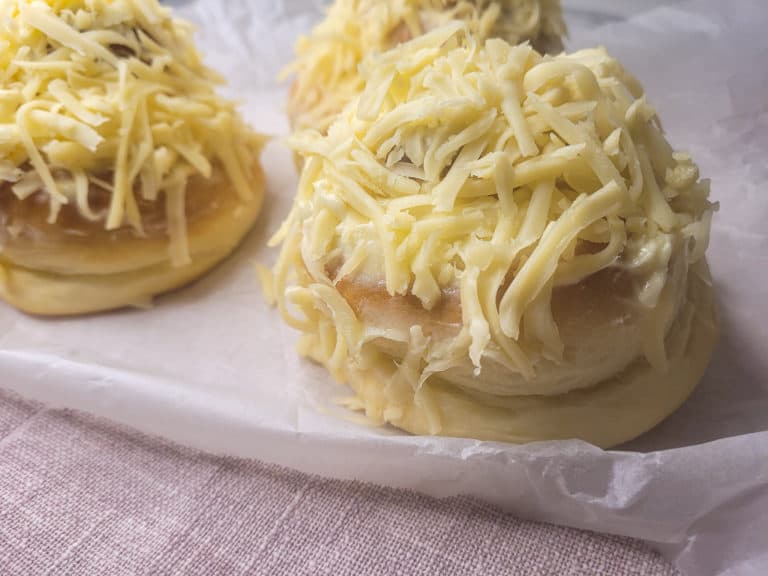 Closeup of ensaymada with cheese topping