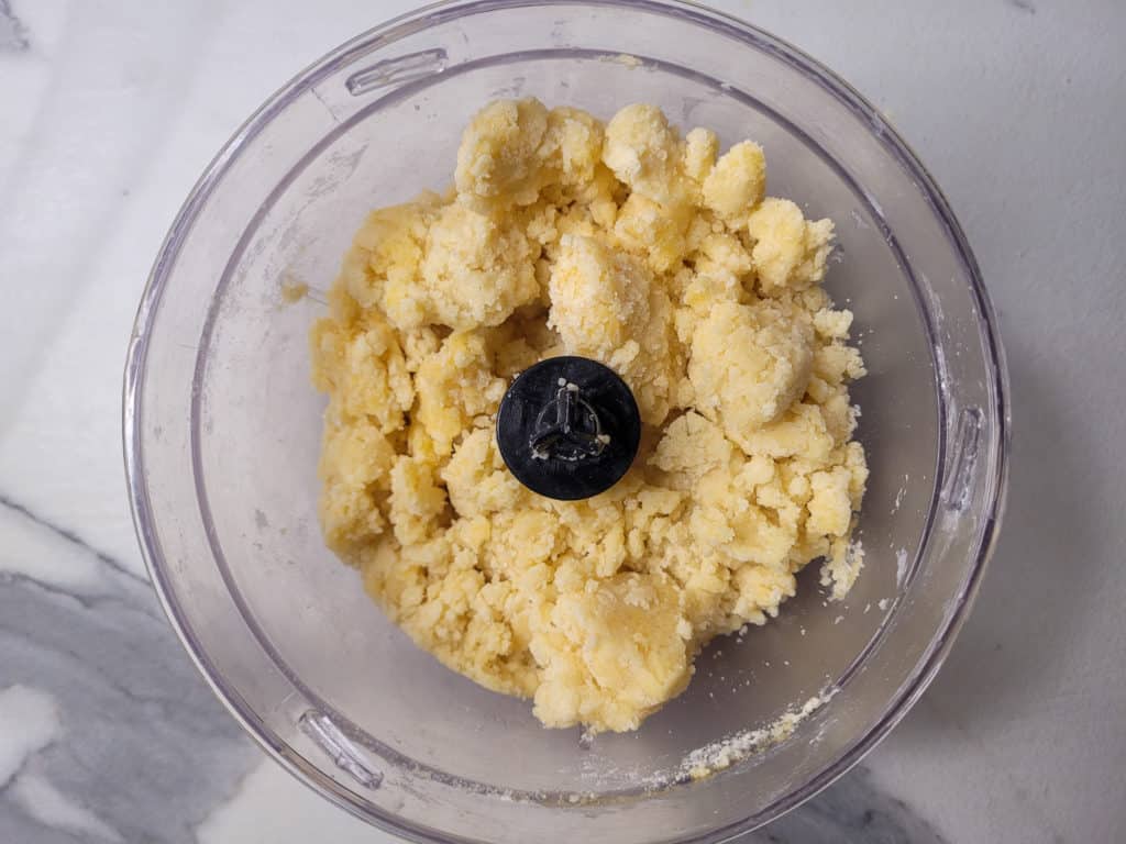 Clumpy dough in a food processor