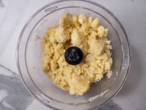 Clumpy dough in a food processor