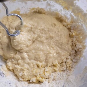 Dough kneaded with dough hooks in a bowl