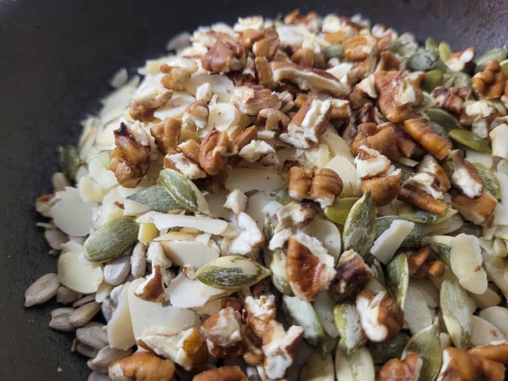 Assorted nuts and seeds in a pan