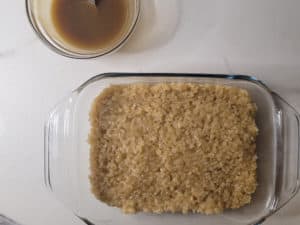 Overhead view of prepped sticky rice and caramel sauce