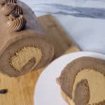 Mocha cake roll with slice of cake