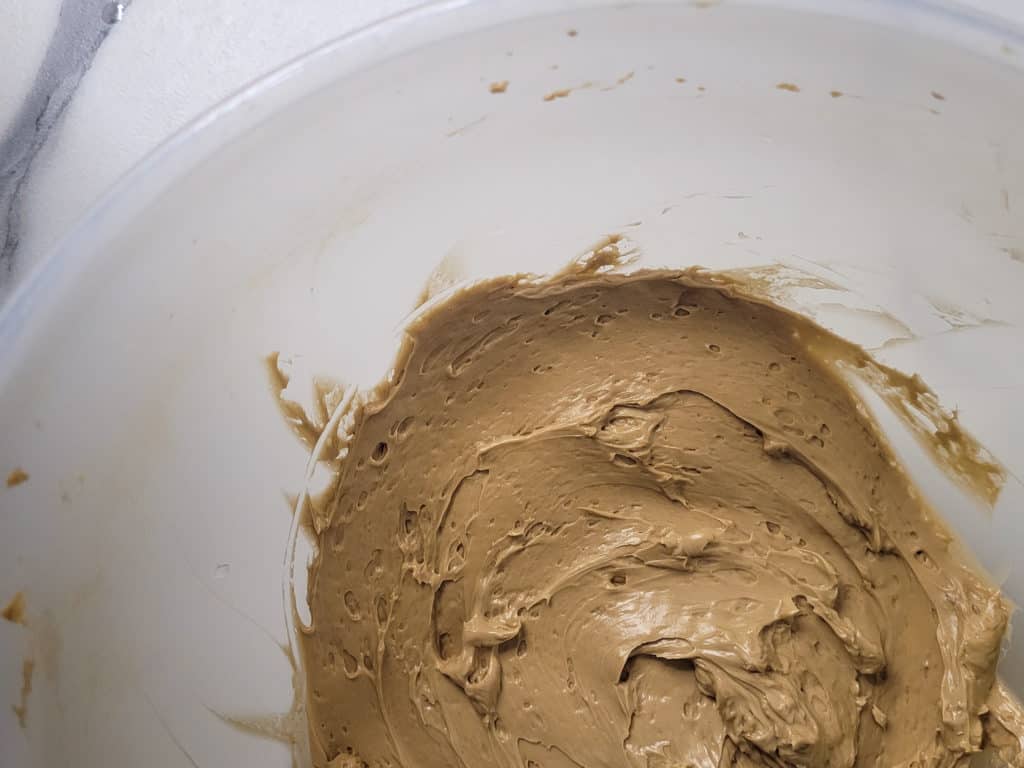Buttercream filling for mocha roll cake in a bowl