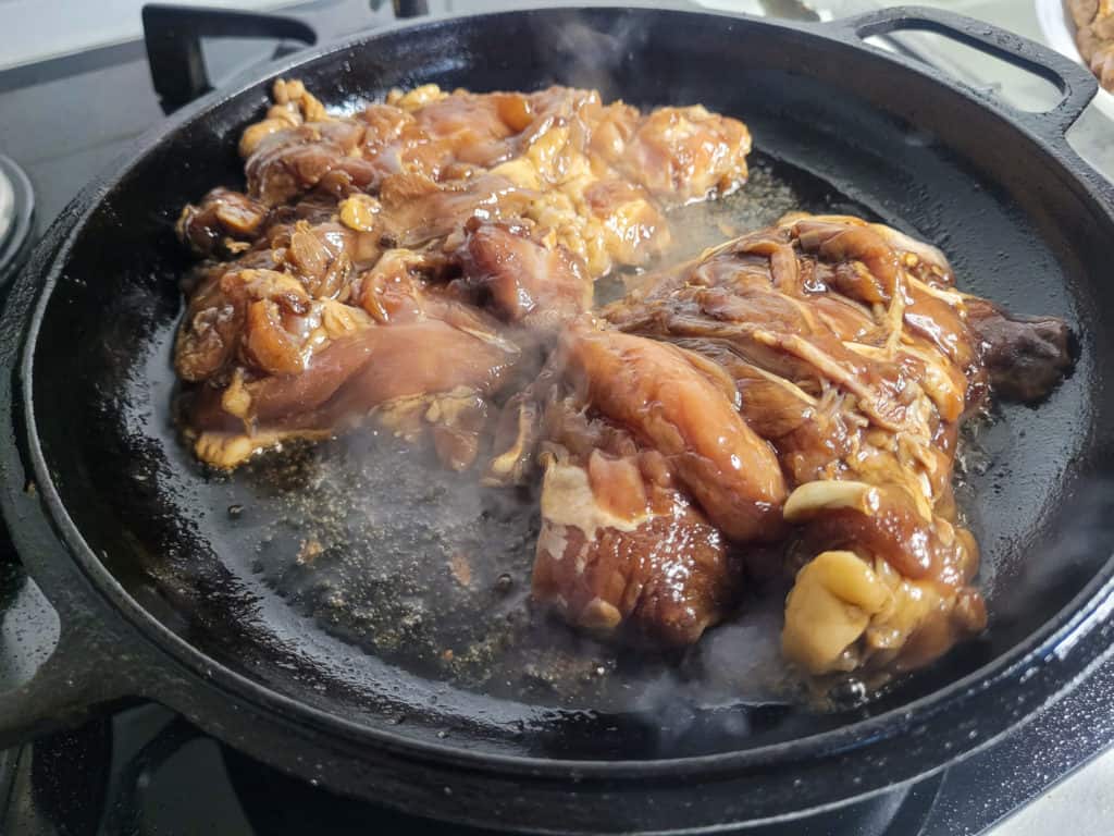 Chicken in cast iron skin side down