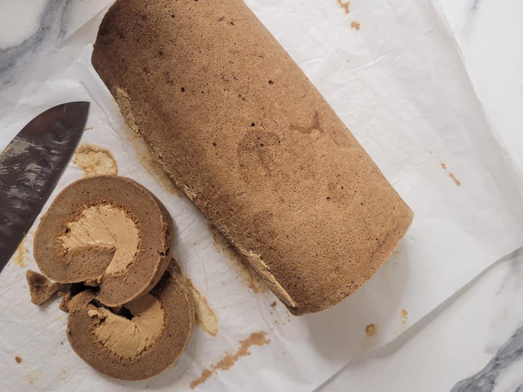 Sliced ends of mocha roll cake