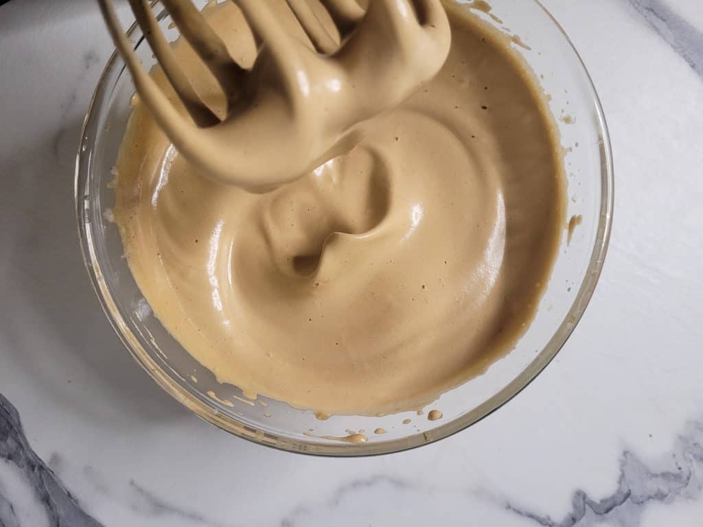 Whipped coffee meringue with electric egg beater