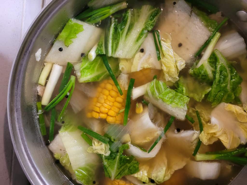 Mixed vegetables in a pot of bulalo or nilaga