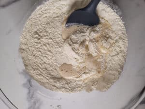 Closeup of siopao dough mixed with water