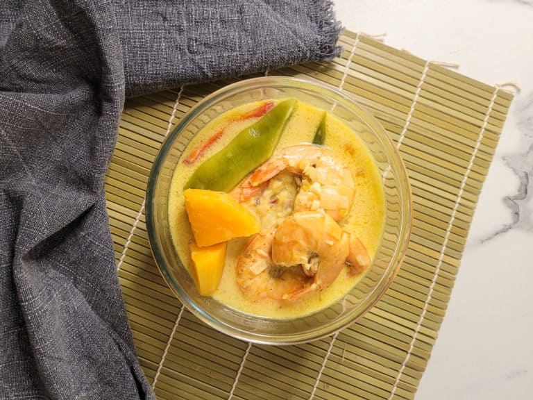 Ginataang hipon in a glass bowl on a table
