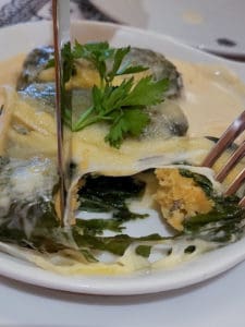 What to Eat in Zurich: Cross section of a capuns, a chard dumpling