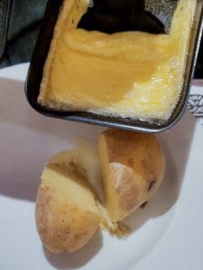 What to eat in Zurich: Raclette or melted cheese on potatoes