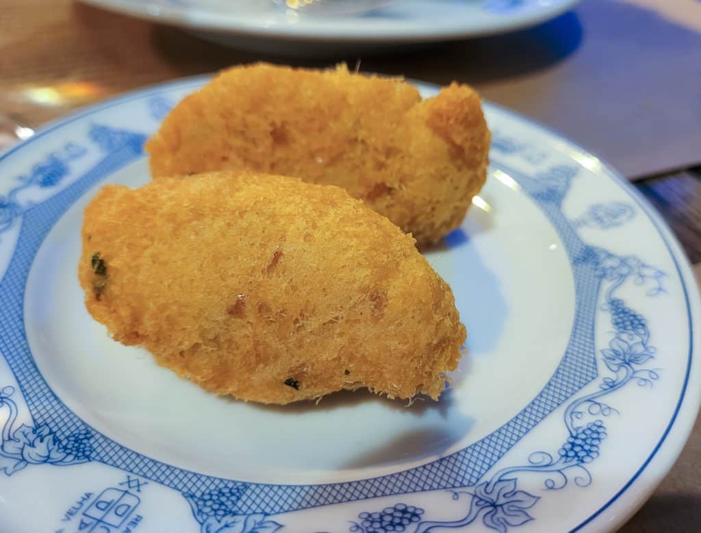 Bolinhos Bacalhau on a plate or Fried cod fritters