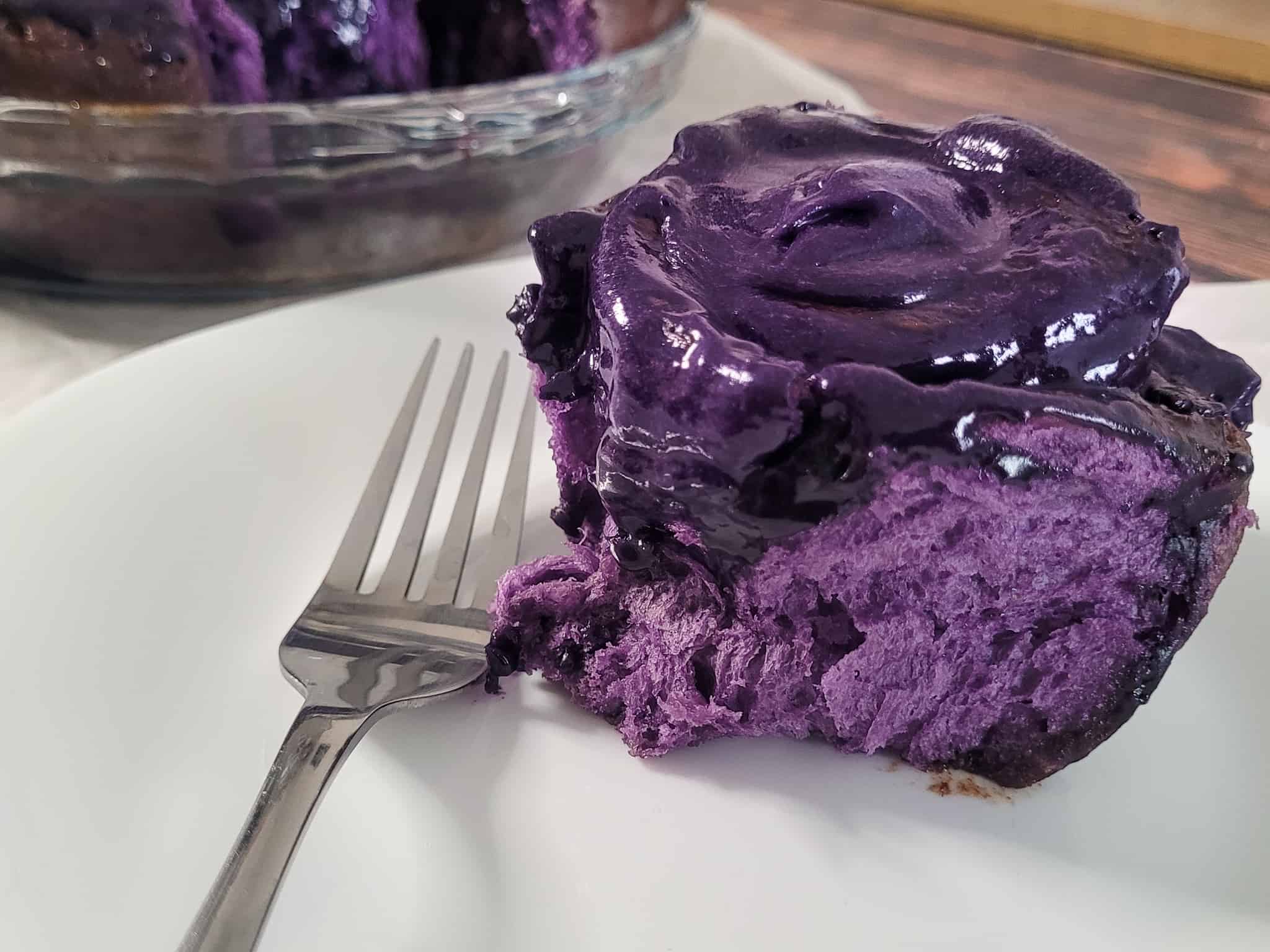 Closeup of finished ube cinnamon rolls