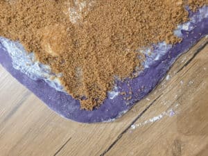 Brown sugar on cinnamon roll dough