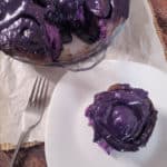 Ube cinnamon rolls on a wood table