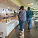 People ordering food in a self-help restaurant in Lisbon