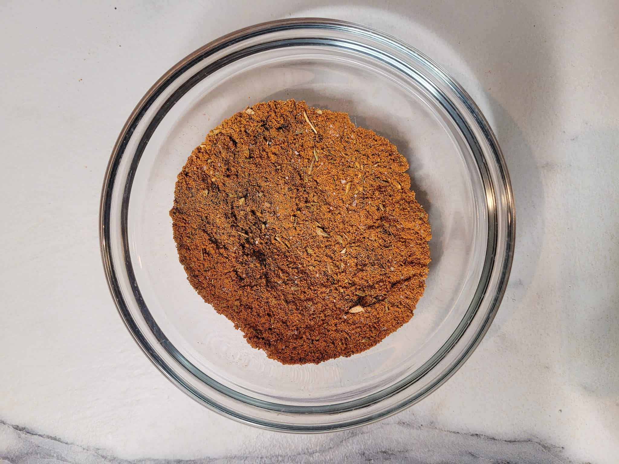 Chili powder seasoning in a glass bowl