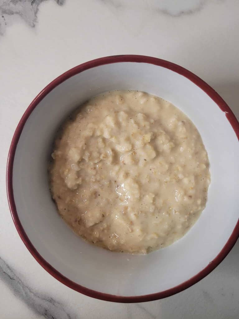 Creamy oatmeal in a white bowl