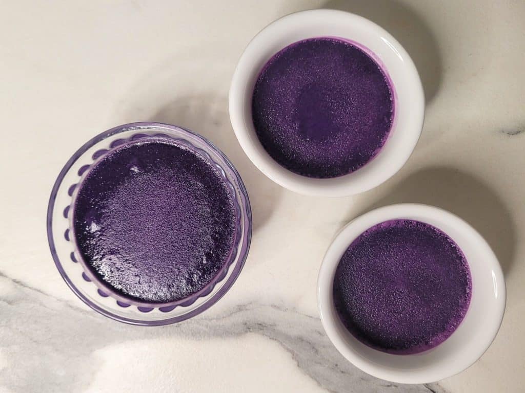 Cooked ube pot de creme on a counter