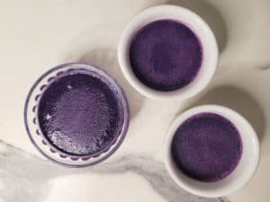 Cooked ube pot de creme on a counter
