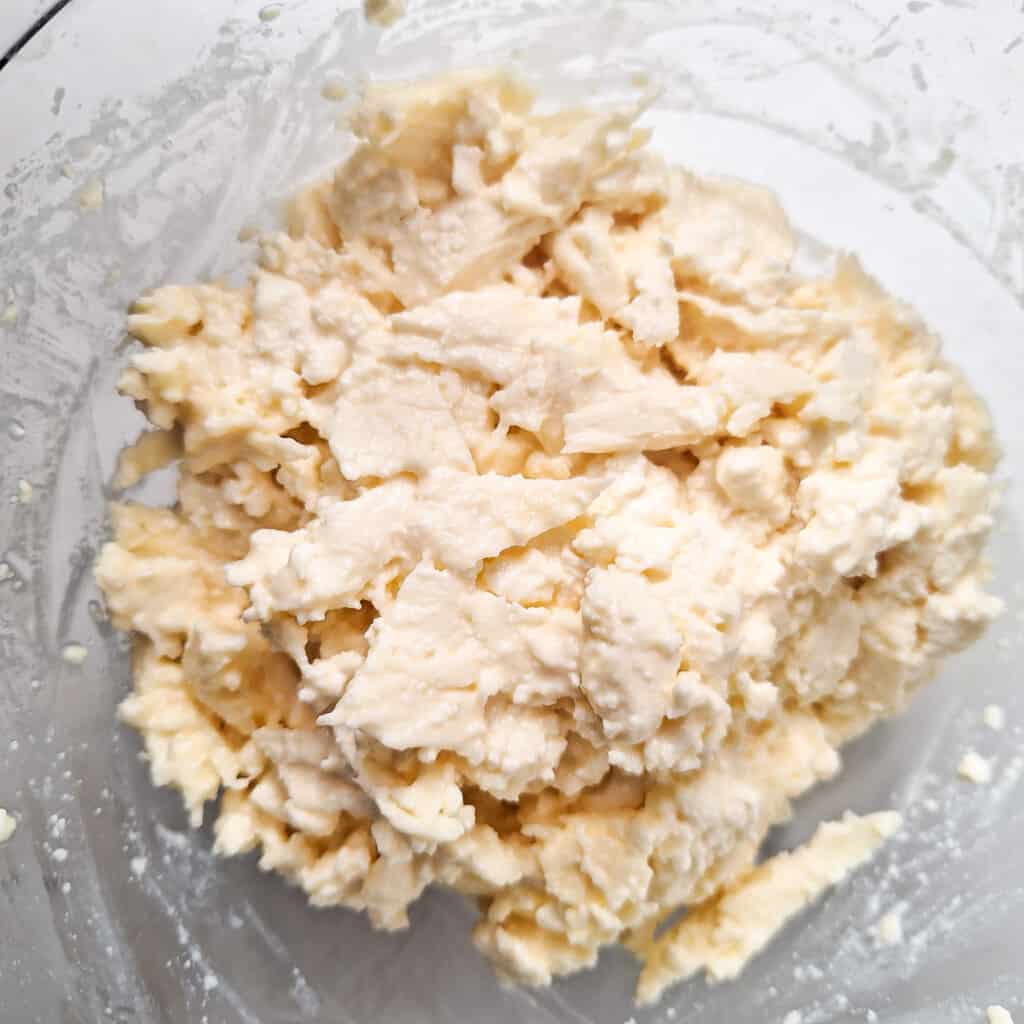 Mixed cheese filling in a glass bowl