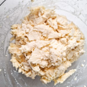 Mixed cheese filling in a glass bowl