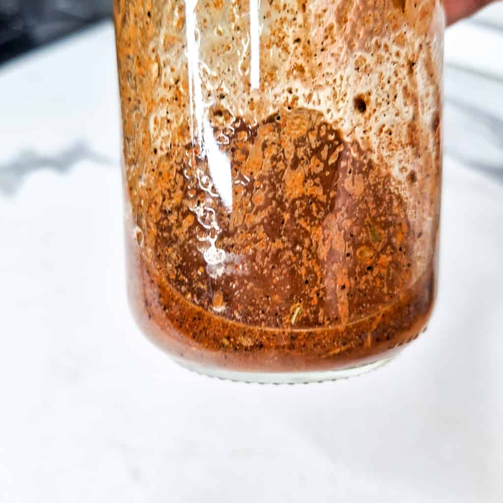 A jar of vinaigrette