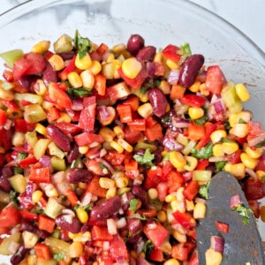 Mixed deced vegetables with corn in a glass bowl