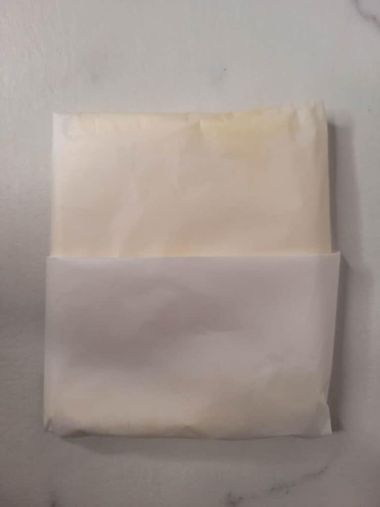 Butter inside wax paper