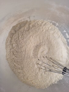 Mixed dry ingredients in a plastic bowl