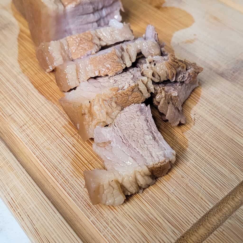 Slices of boiled pork belly or suyuk