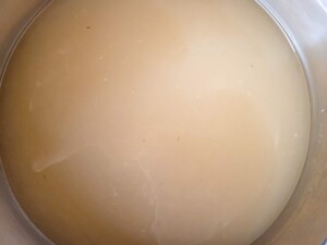 Water in a pot with salted soybean paste for suyuk or boiled pork