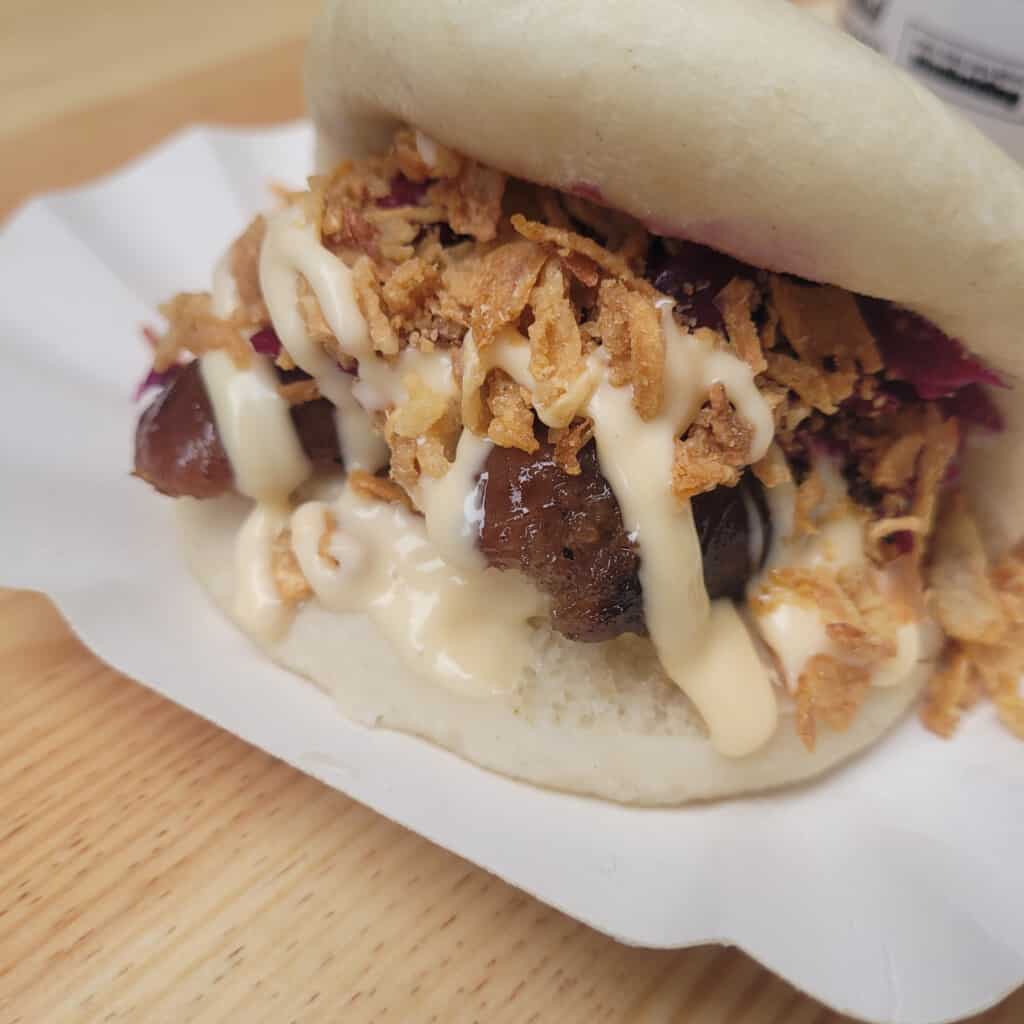 Closeup of longganisa bao or bun from a stand