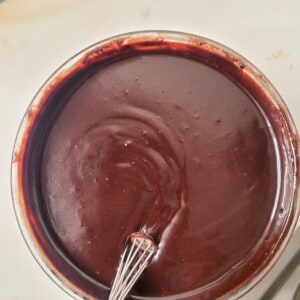 Melted chocolate in a glass bowl