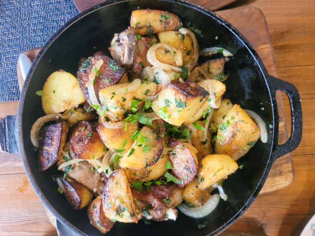 Ojakhuri a Georgian dish in a cast iron pan