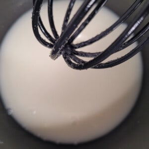 A combination of cornstarch, water, and lemon juice in a pot.