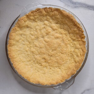 Strawberry custard pie crust after baking in the oven.