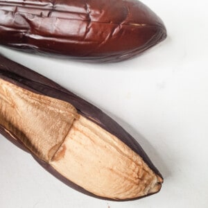 Peel the roasted eggplants like a banana