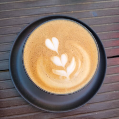 Latte art that shows three hearts