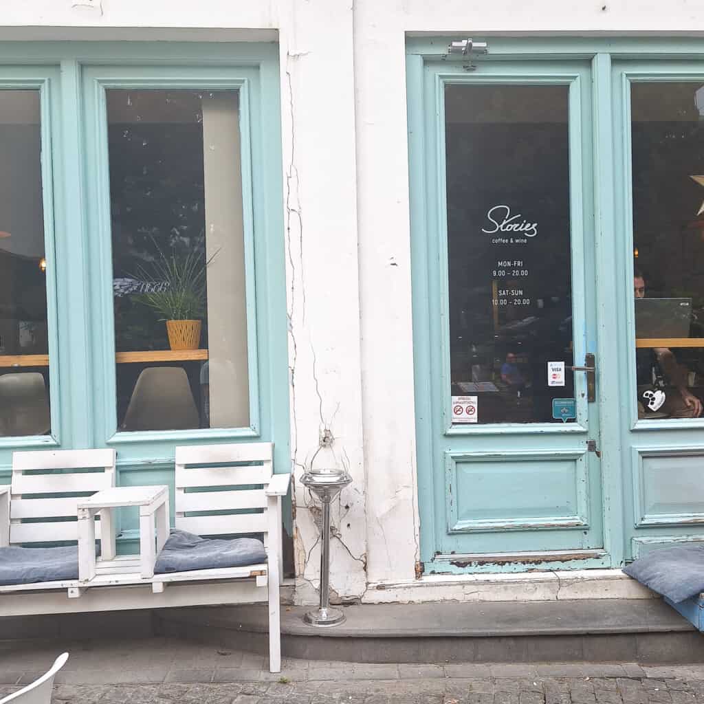 The blue-framed doors of Stories coffee shop