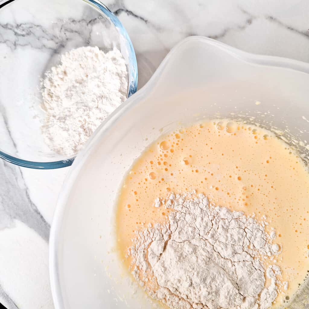 Add flour to bowl of pancake batter