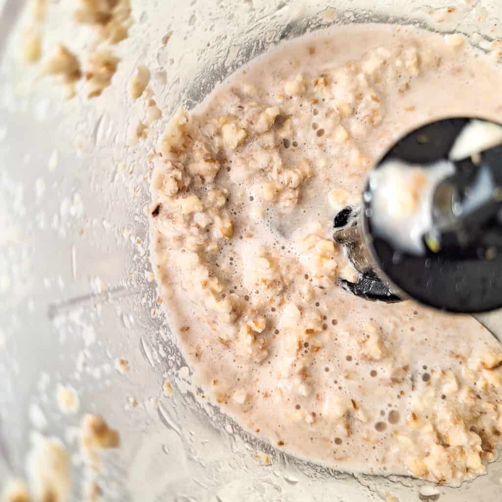 Pulverized and crushed walnuts for walnut dressing in a food processor
