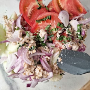 Mix the walnut dressing to the vegetables to make Georgian cucumber tomato salad